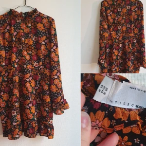 Blommig klänning, asos, kort, 46 - Superfin klänning i storlek 46. Använd 3 gånger. Inköpt förra året. 