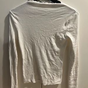 Långärmad tröja  - Storlek xs, men passar mer som S. Aldrig använd. 