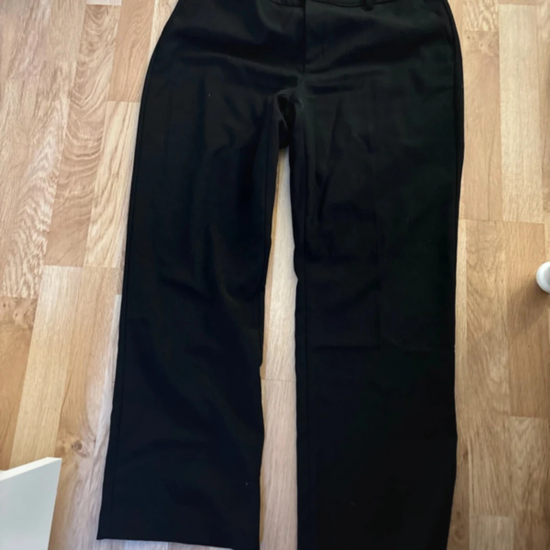 Svarta kostymbyxor 
