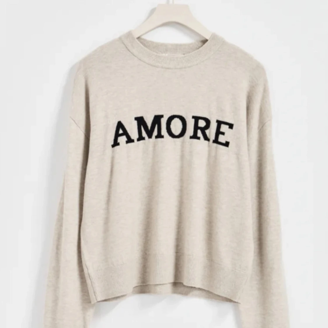 Stickad tröja från gina