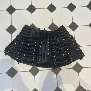 Randig kjol  - Står ingen storlek i men skulle säga xs/s