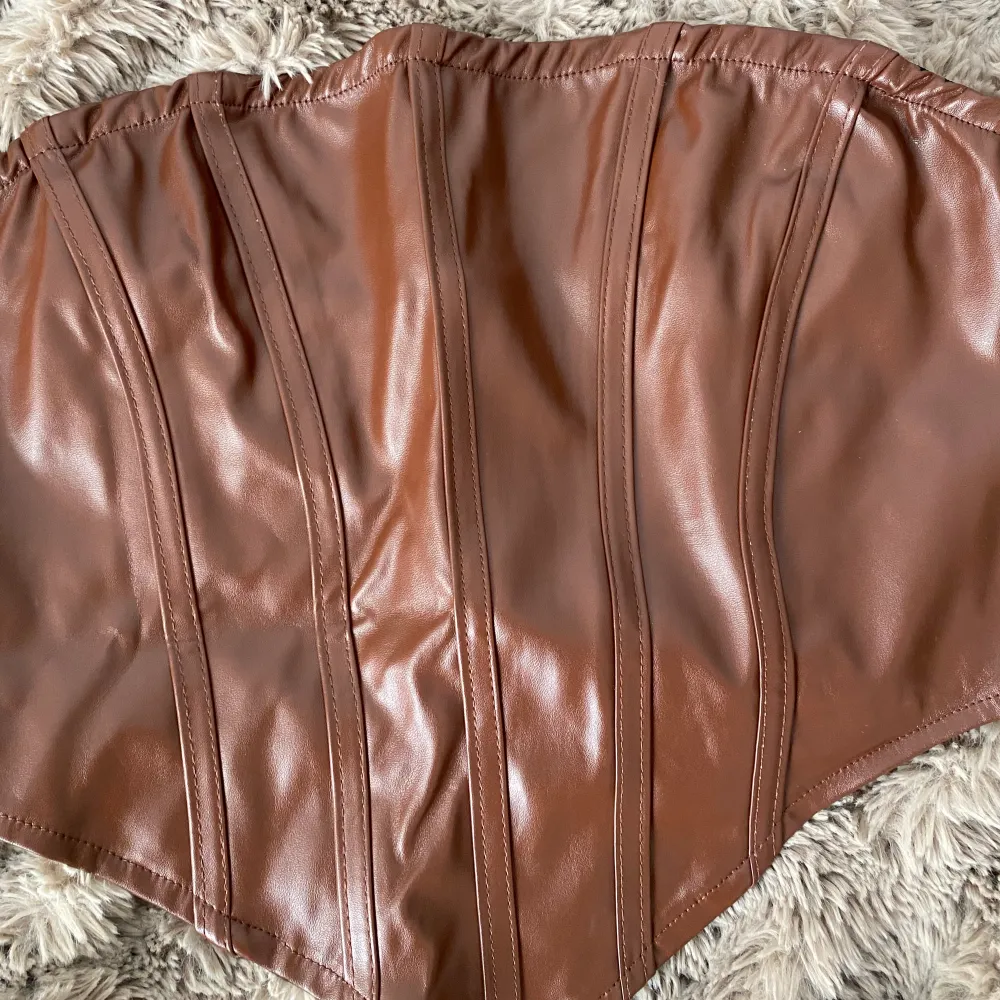 Leather top . Toppar.