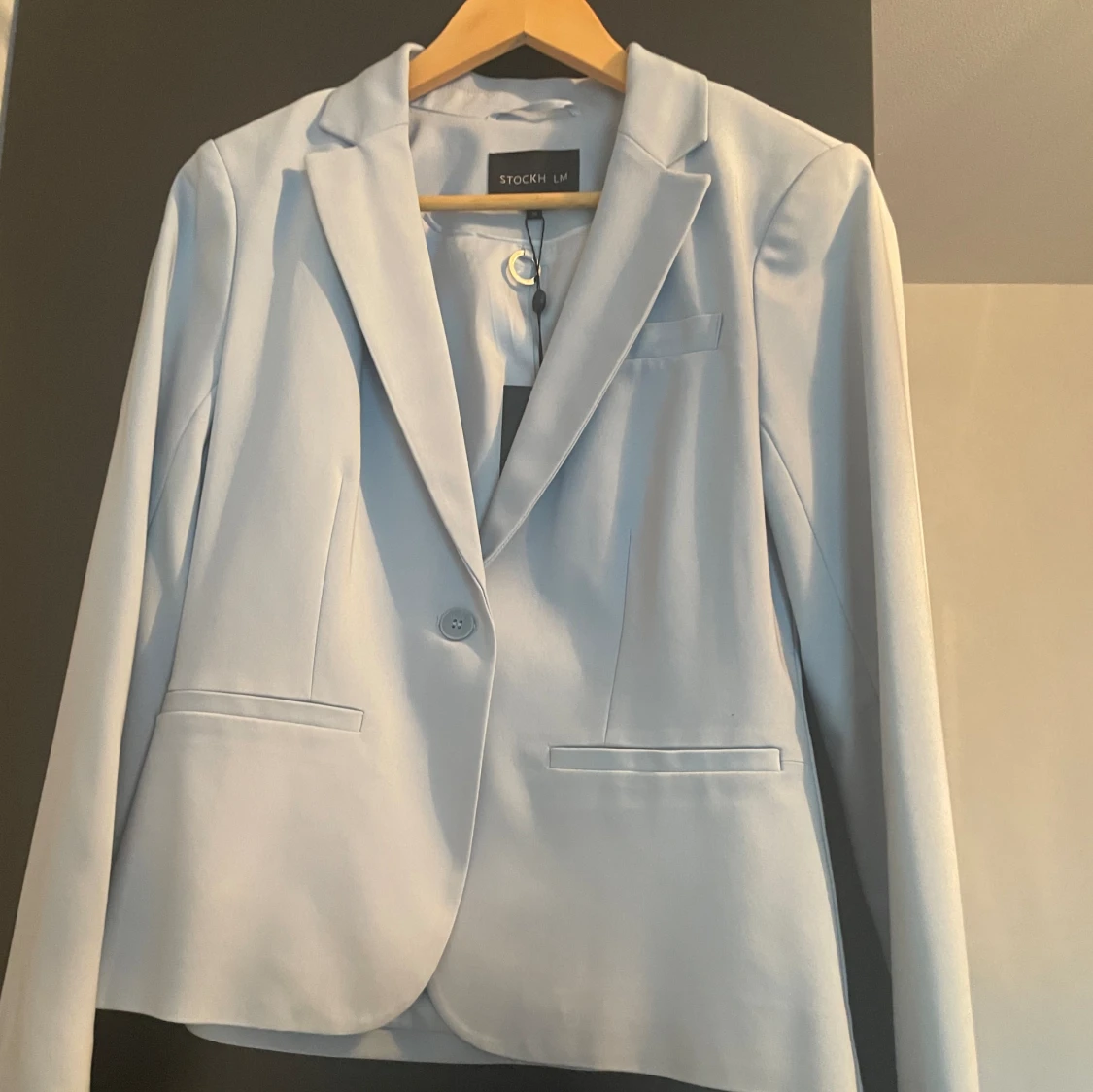 Ljusblå blazer (prislapp kvar) - 91