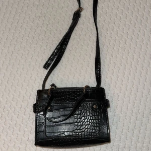 Väska - Fin väska lite slitage Kan mötas i malmö