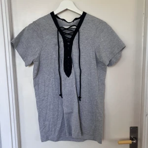 Oversize t-shirt - En grå oversize T-shirt, oanvänd.