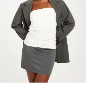 Grå minikjol - Nyskick, slutsåld