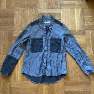 skjorta - knappt använd. ganska löst material, 100% lyocell