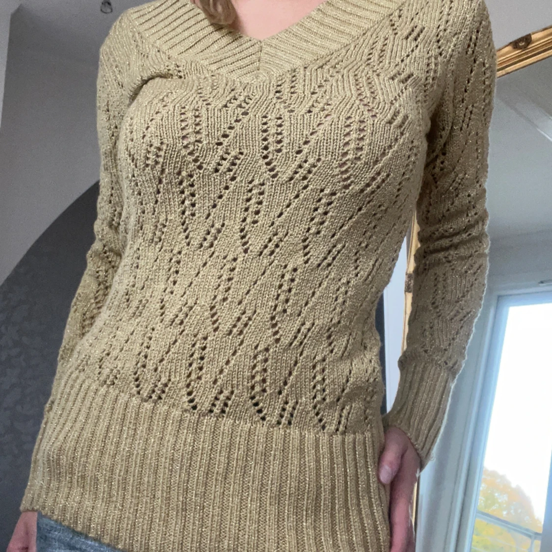 Glittrig stickad tröja 