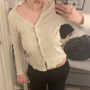 Kofta - Kofta i strl S/M? Skulle jag säga, kan ej se.