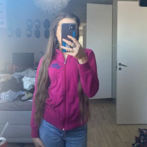 Luvjacka - Luvjacka från Nike, lila rosa färg