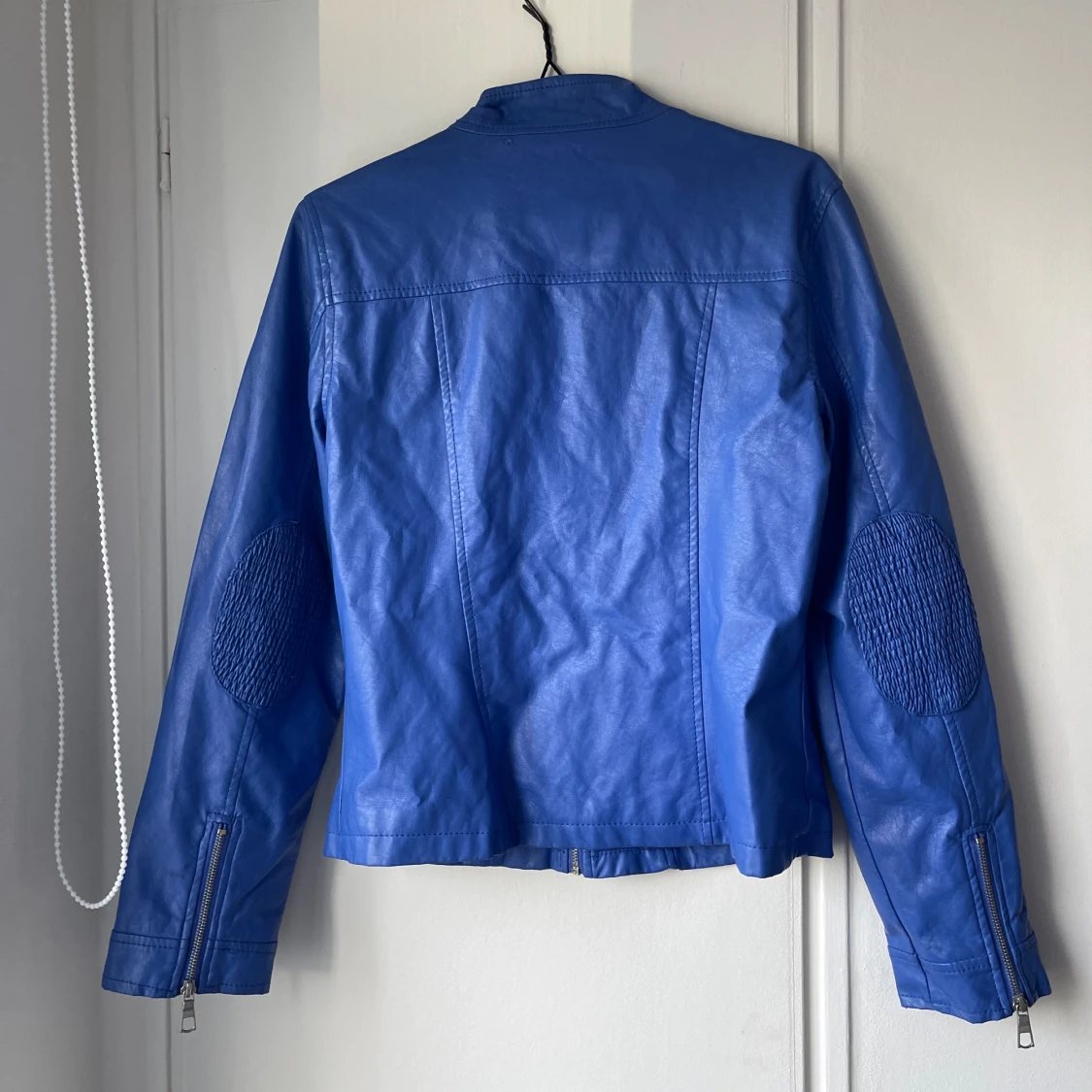 Blå skinnjacka  - 91