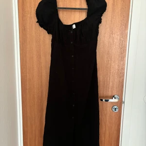 Klänning  - Endast använd en gång