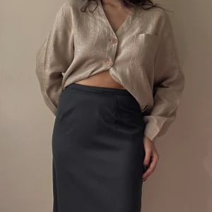 Wool Blend Green Pencil Skirt - Pencil skirt with side stitch. Back zipper detail.  Constructed with Deadstock Scrap Runway Designer Wool Fabric  49 CM/ 19.3 IN Length  66 CM/ 26 IN Waist  78 CM/ 30.7 IN Hips