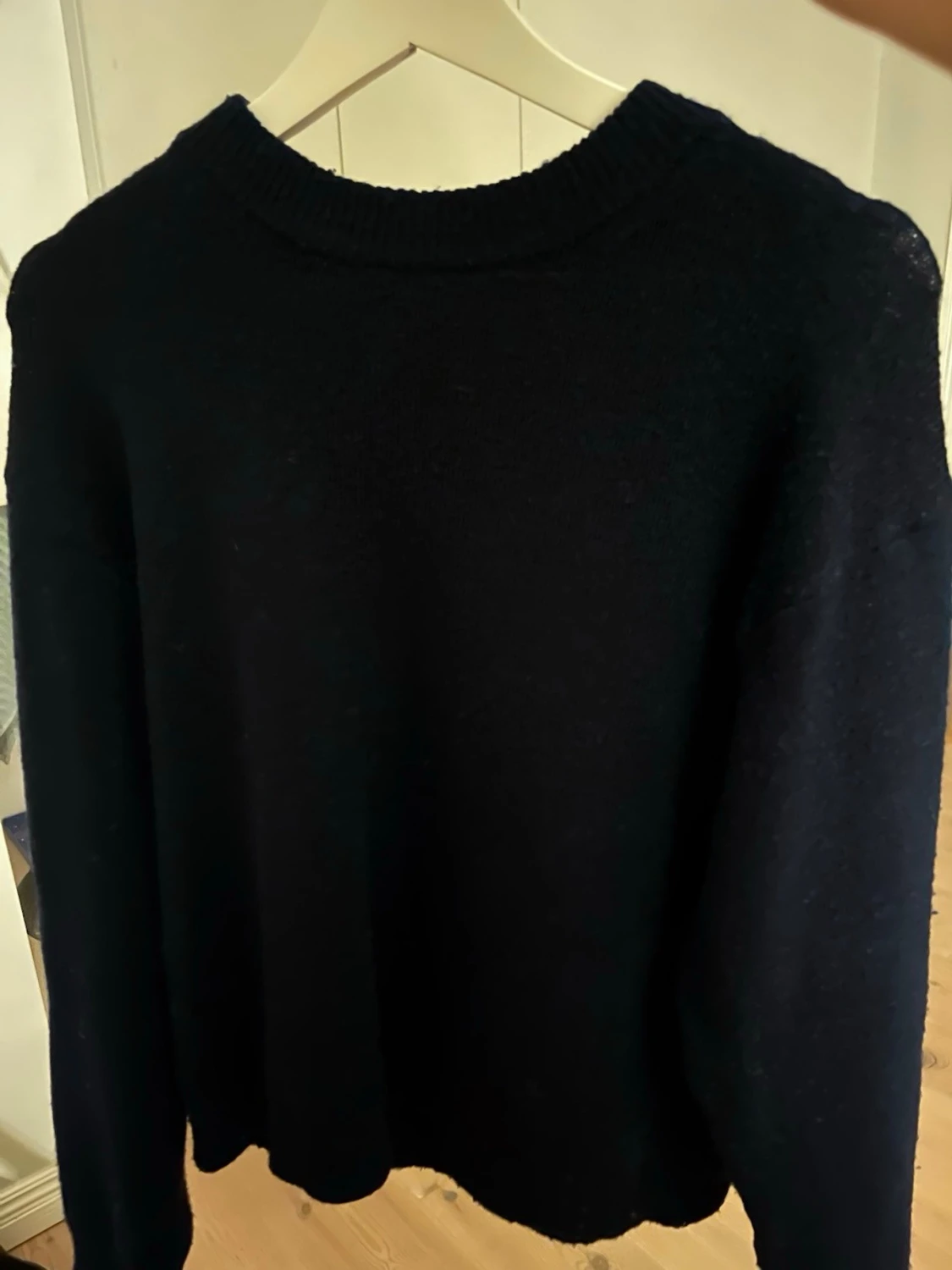 Mörkblå stickad tröja från H&M XS