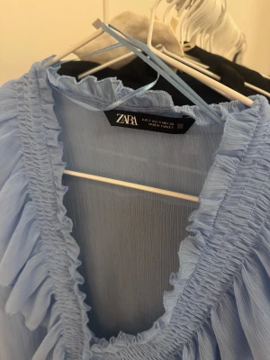 Blus - Storlek Small