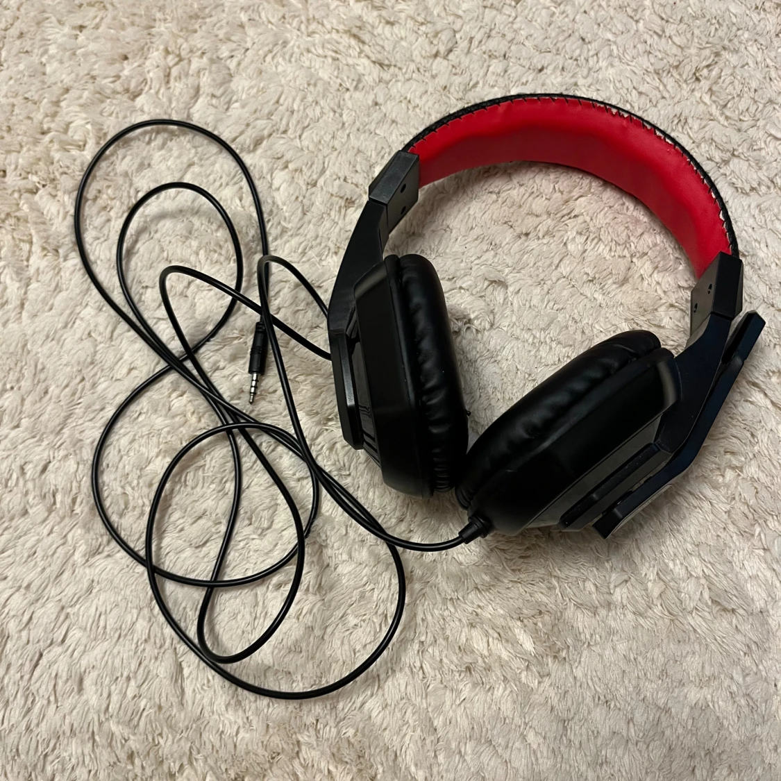 Kabelanslutet spelheadset med mikrofon