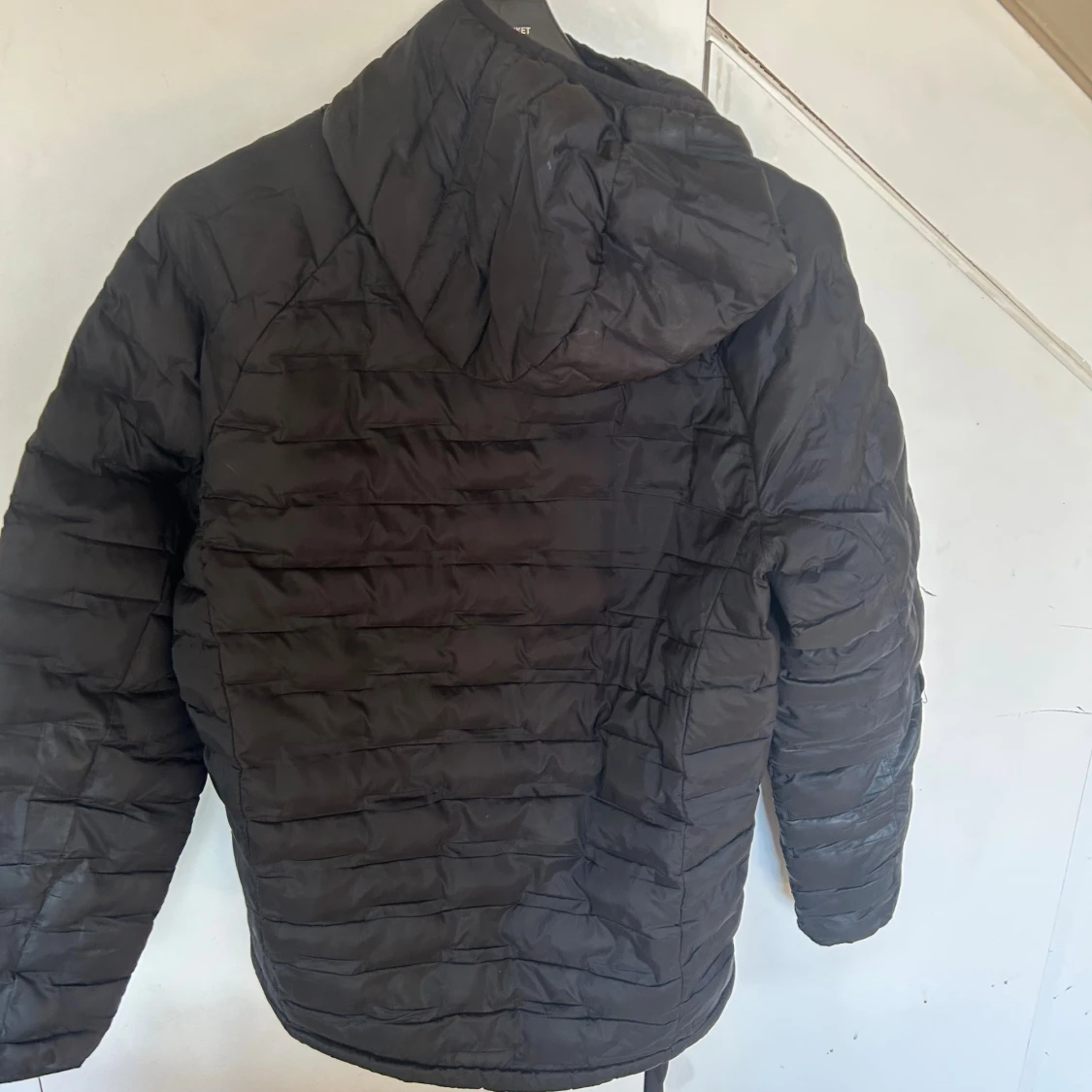 Svart dunjacka Peak Performance - 1