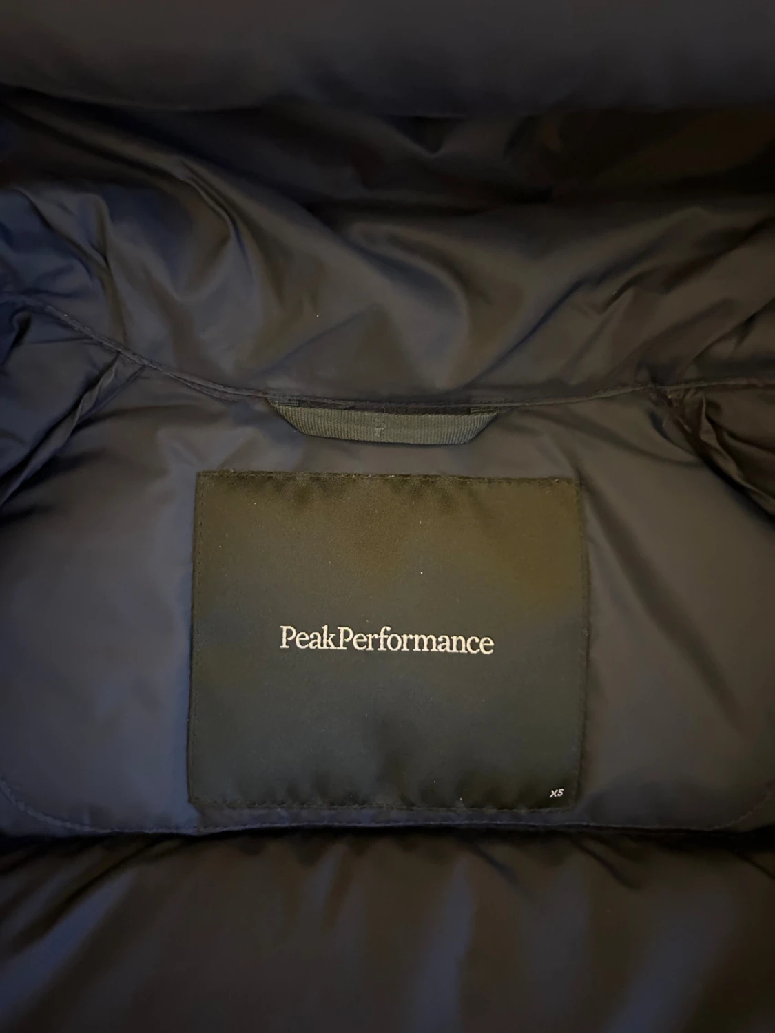 Mörkblå pufferjacka Peak Performance XS - 3