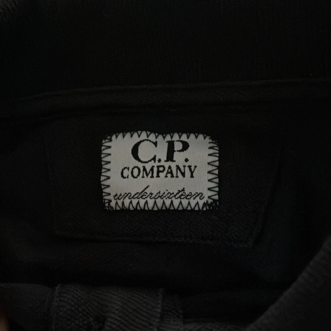 Mörkblå piké från C.P. Company - 2