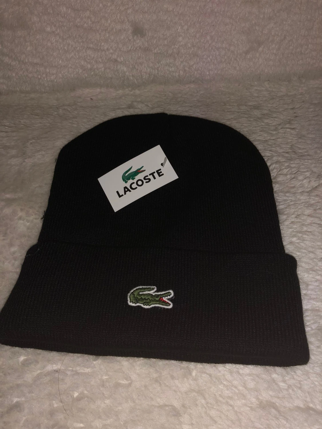 Svart stickad mössa från Lacoste - 1