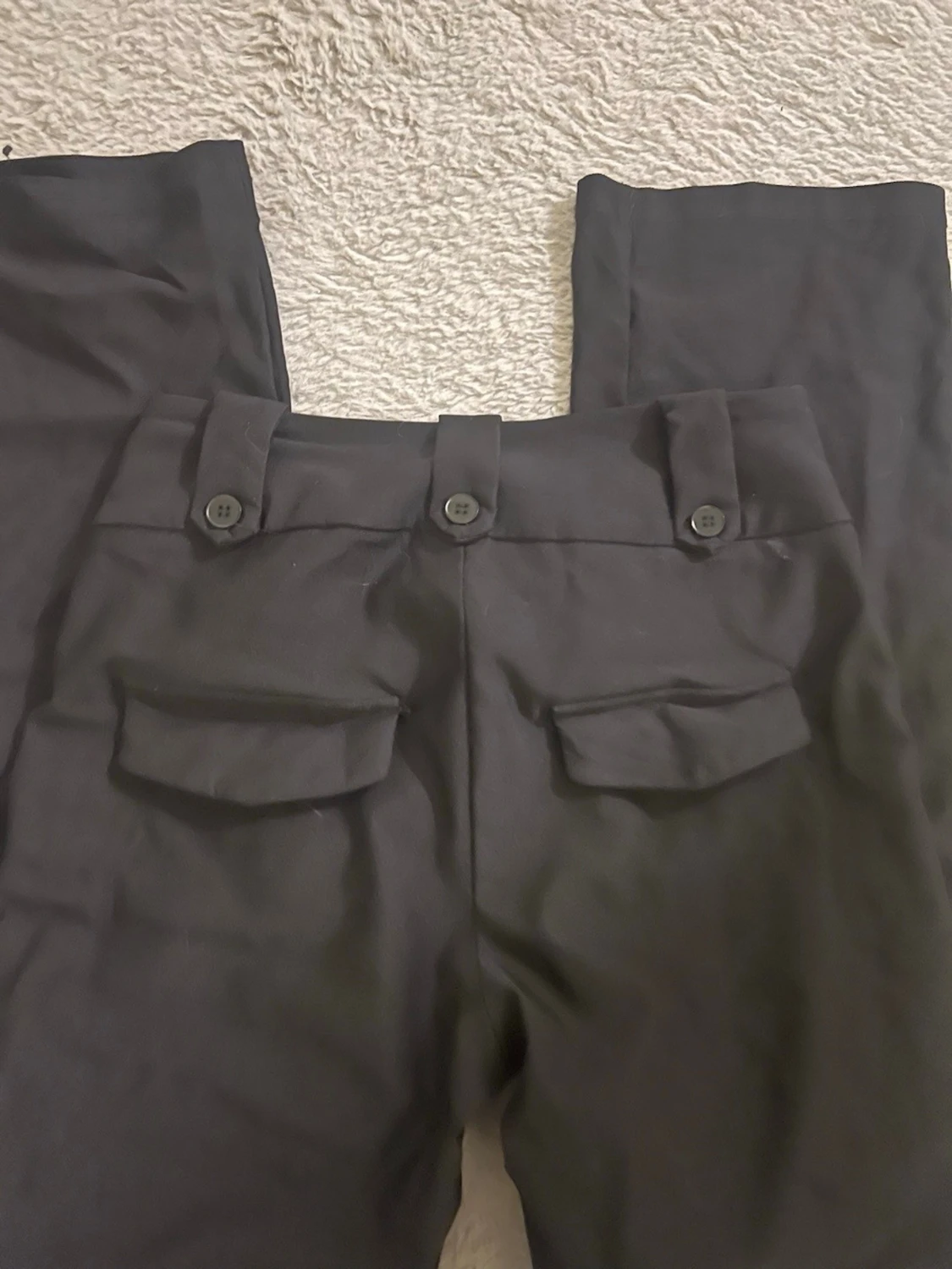 Svarta kostymbyxor med knappar