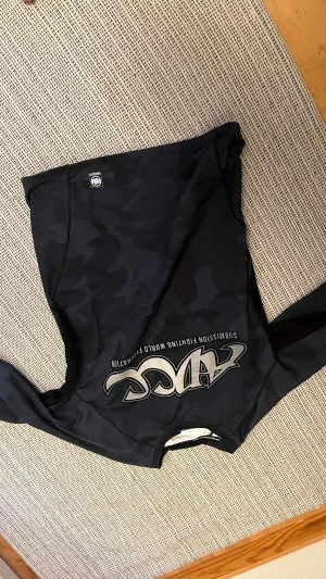ADCC Bjj nogi Rashguard size L - Adcc Rashguard från pitbull size L 