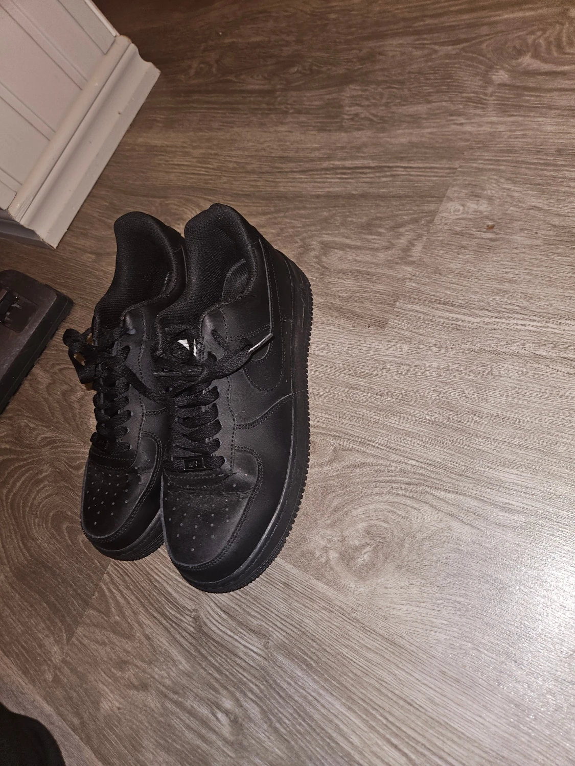 Svarta Nike Air Force 1 sneakers