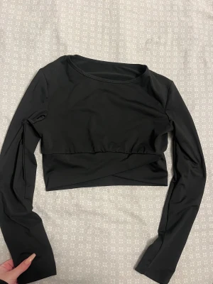 Tränings tröja - Svart träningströja, vet inte vart ifrån å storlek men tror xs/s