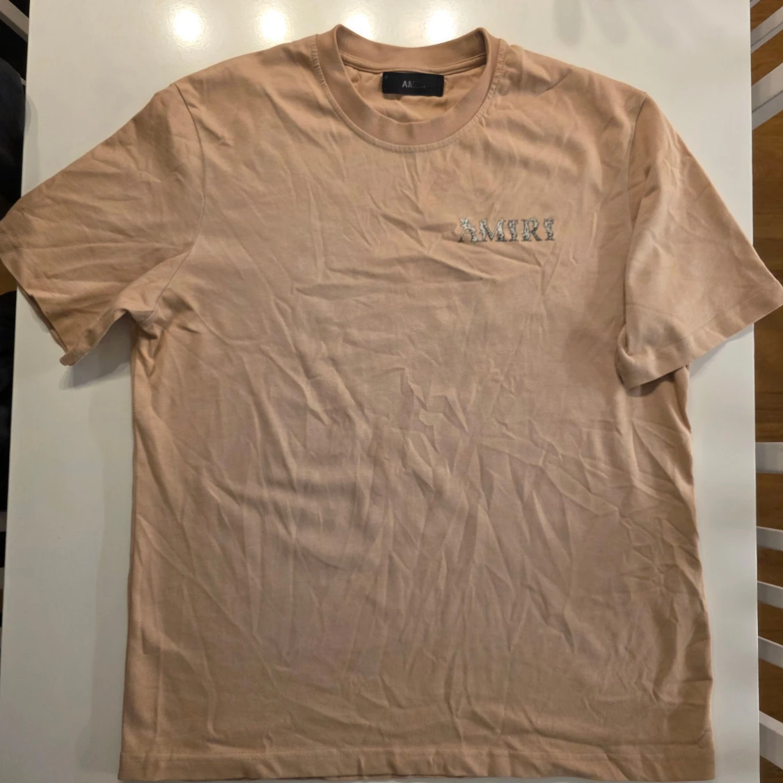 Beige AMIRI t-shirt i bomull