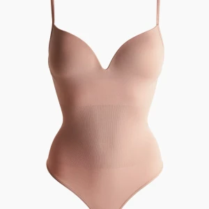 Body fra H&M - Selger denne helt nye bodyen fra H&M i str xs! 