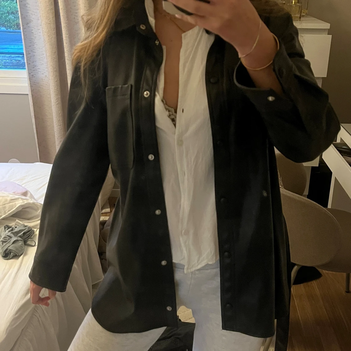 Svart skinnkappa - 1