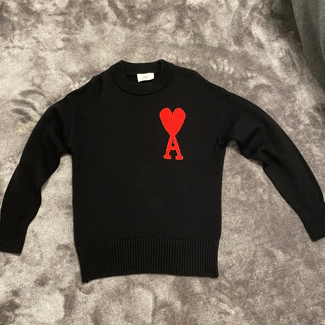 Svart stickad tröja från Ami Paris