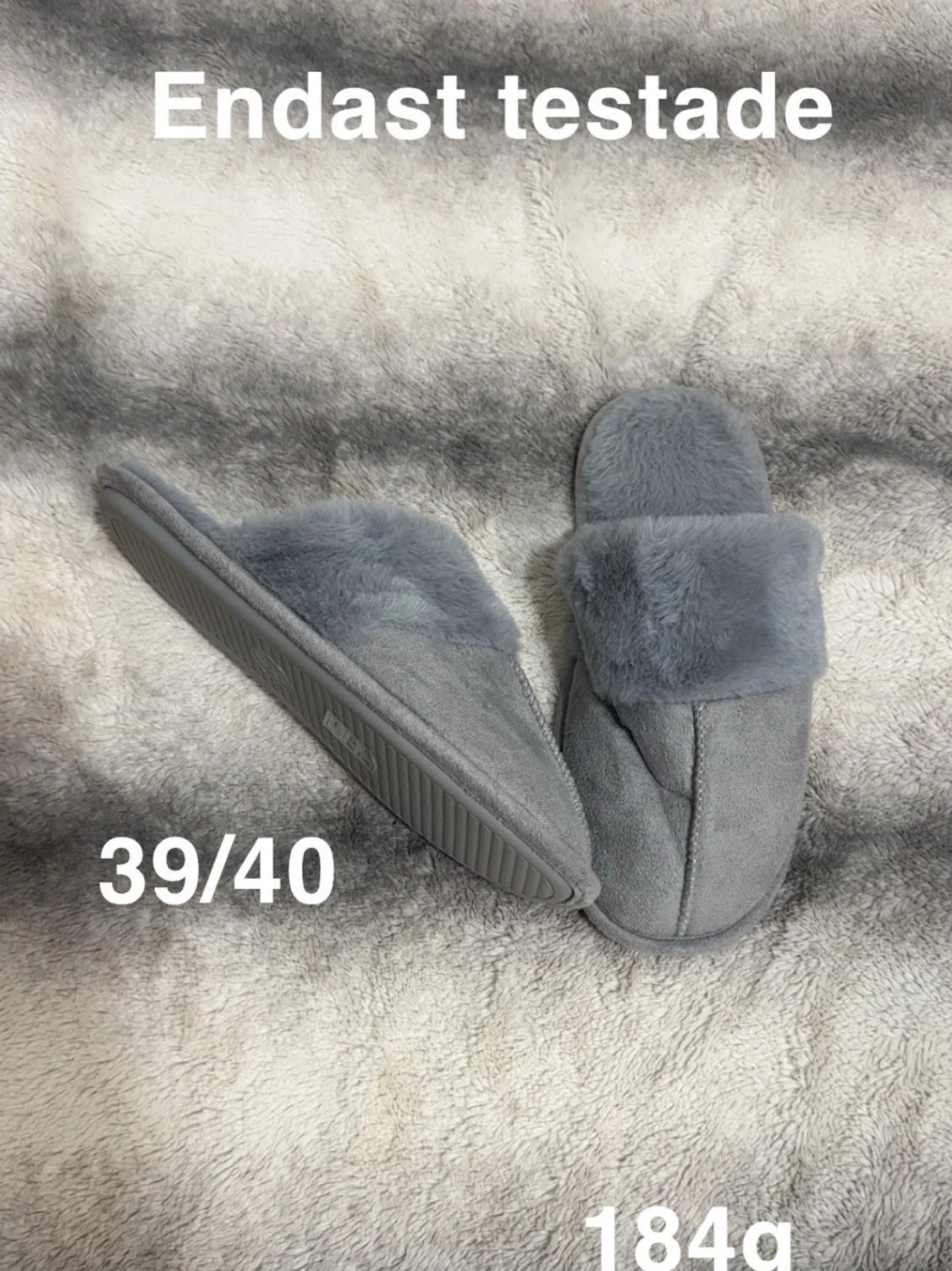 Grå fluffiga tofflor i storlek 39/40