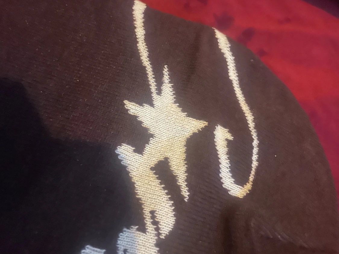 Svart stickad väst med stjärnmönster - 1