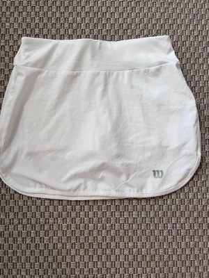 Wilson padelkjol tenniskjol XS vit - Wilson padelkjol tenniskjol XS vit