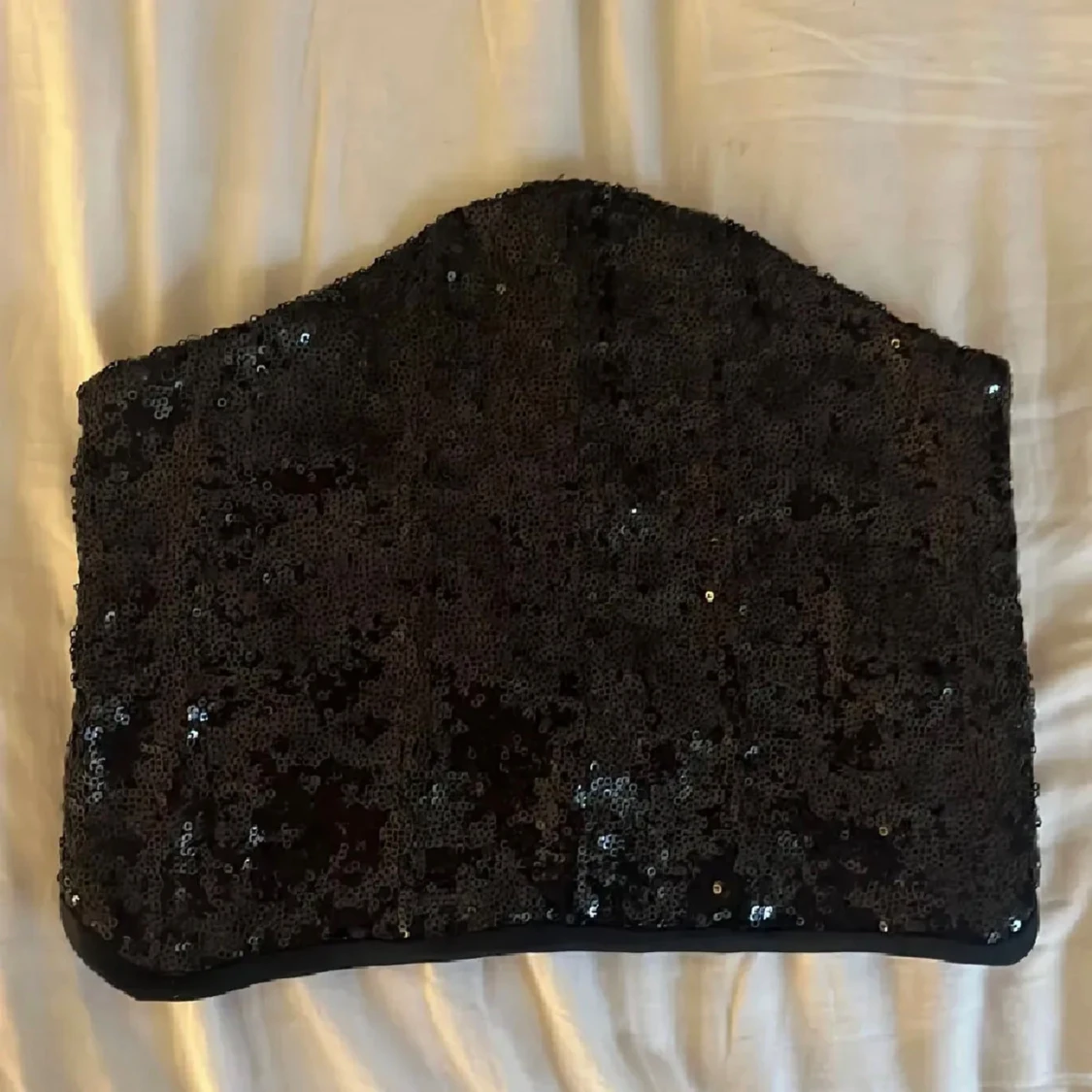 Svart paljettkorsett med snörning