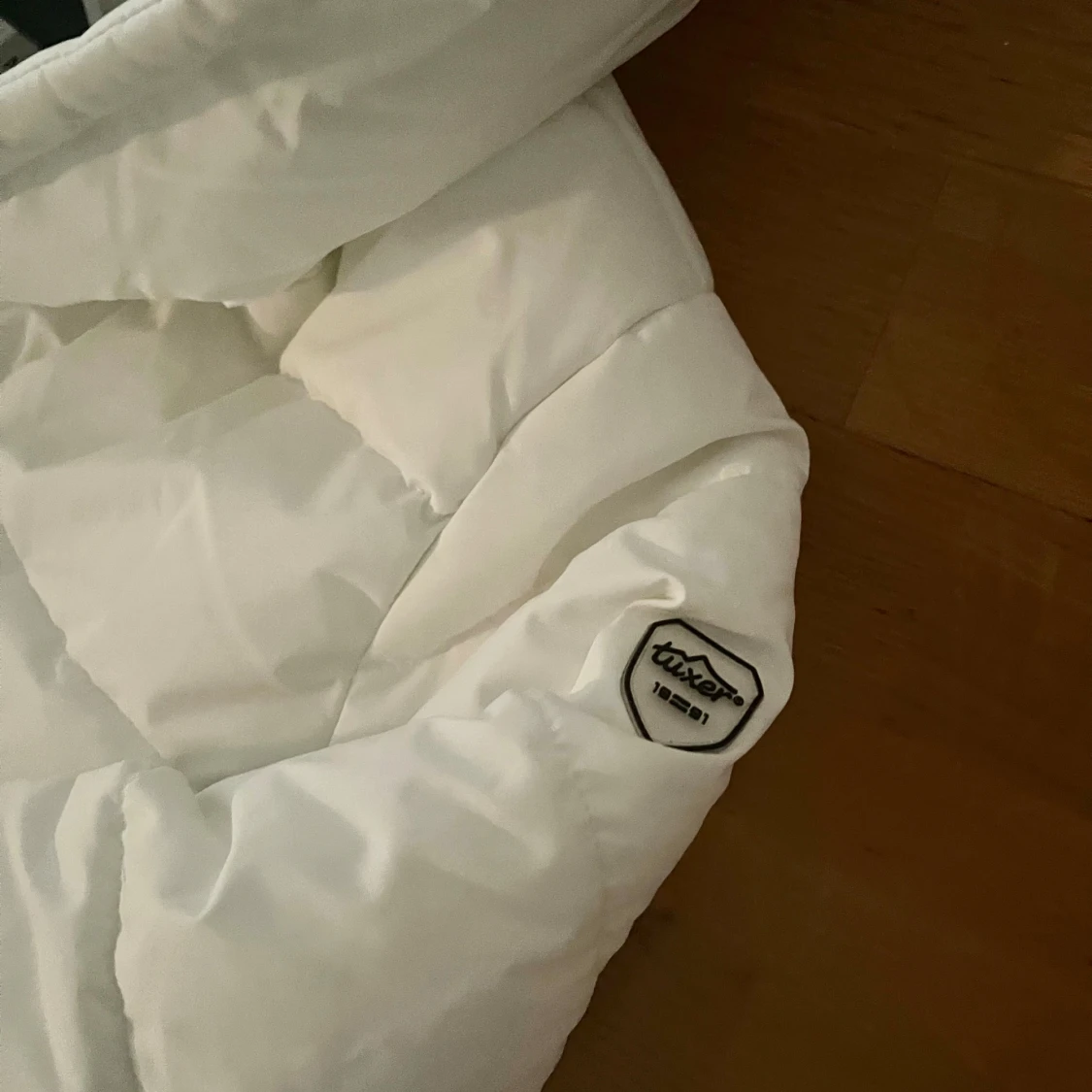 Ny lång dunjacka från Tuxer - 4