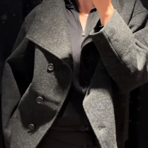 Grå kappa - Använder ej