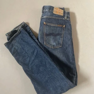 Feta Nudie jeans  - As snygga nudie jeans i modell grim trim de är lite använda men väldigt bra skick. Vid snabb affär så kan priset sänkas! 