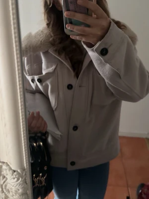 Ljusrosa kappa  - Från Noella i storlek M 