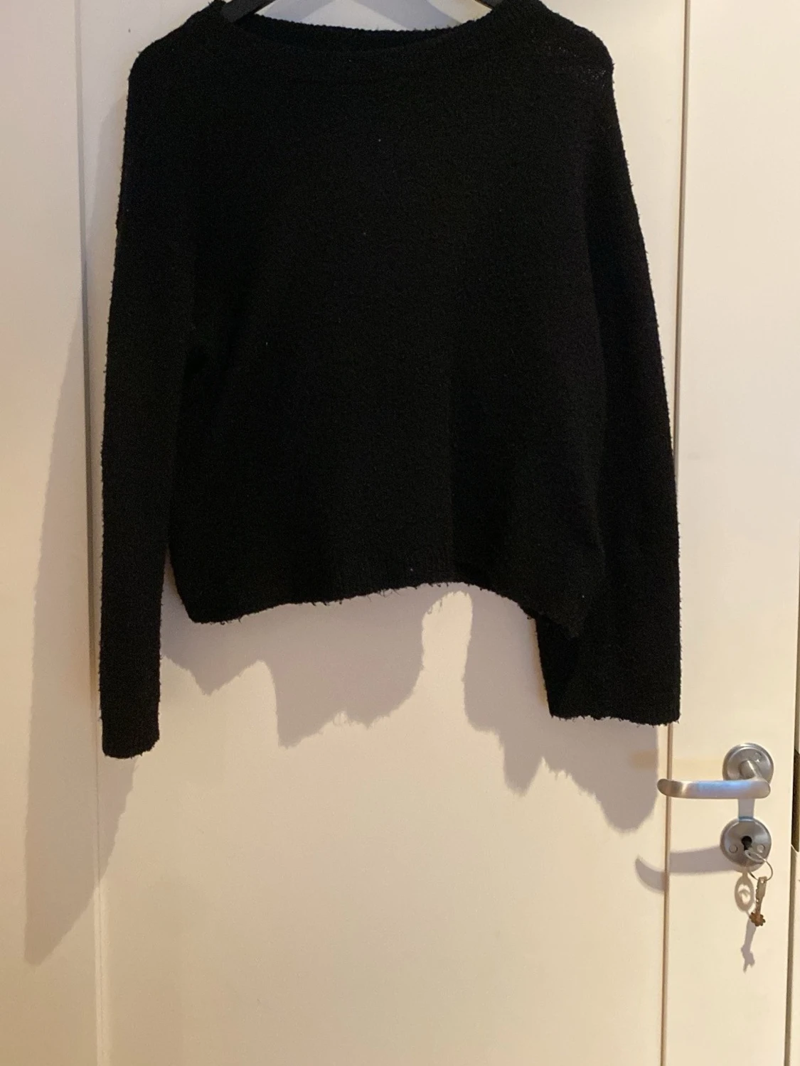 Svart stickad tröja från 157