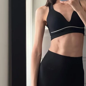 Svart sporttopp Aim'n  - I gott skick.