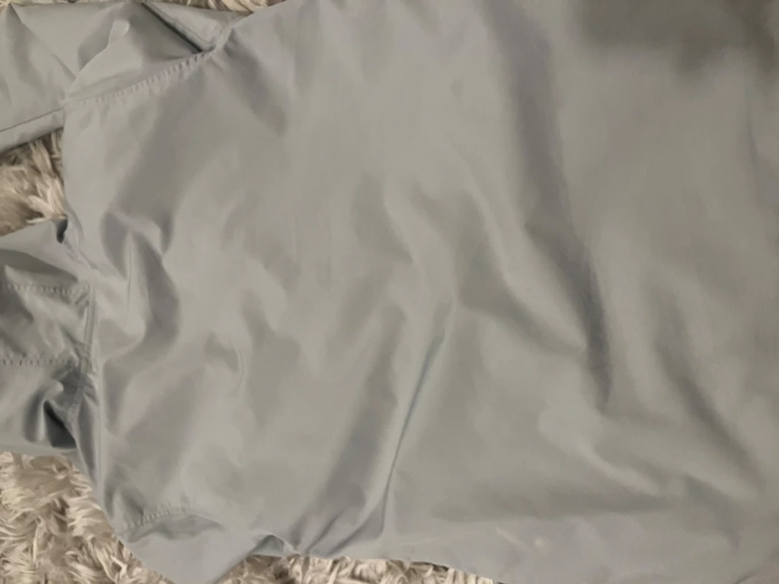 Ljusgrå vindjacka Under Armour XS