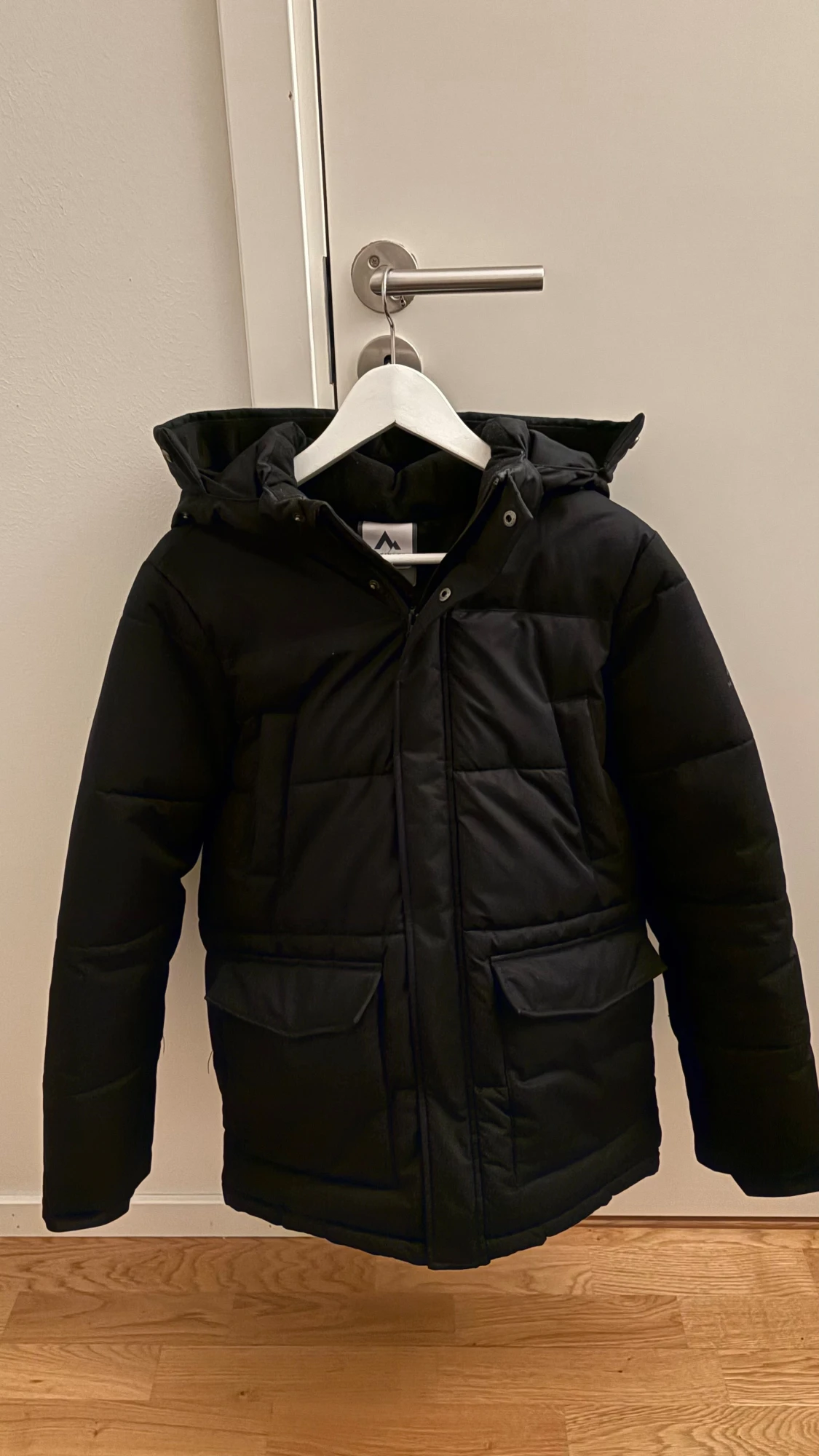Svart pufferjacka från Mckinley