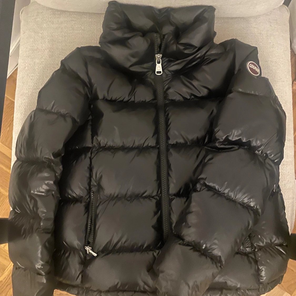 Svart dunjacka från Colmar