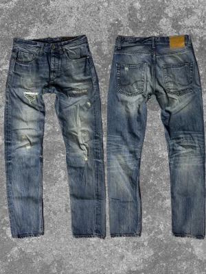 Jack and Jones Jeans med skön wash - Unika och stilrena, inga defekter. Skriv vid fundering🙏😊Mått: A:39 B:70 C:23 D:20 E:17 (cm) Vet ej storleken, gissar på W29/30/31 baserat på måtten! 