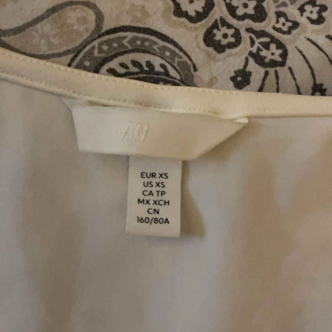 Vit topp med spets från H&M - 2