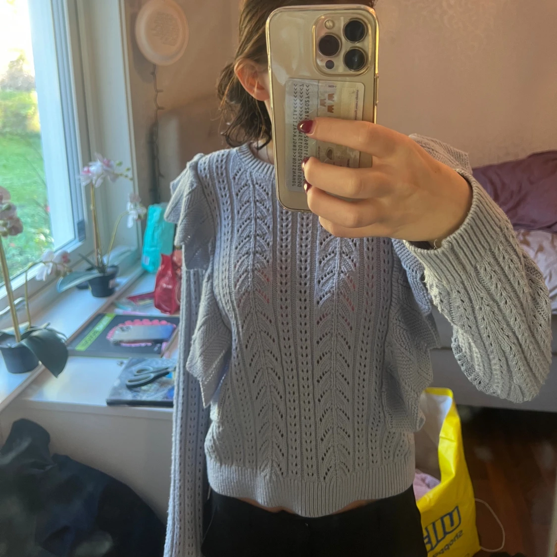 Ljusblå stickad tröja