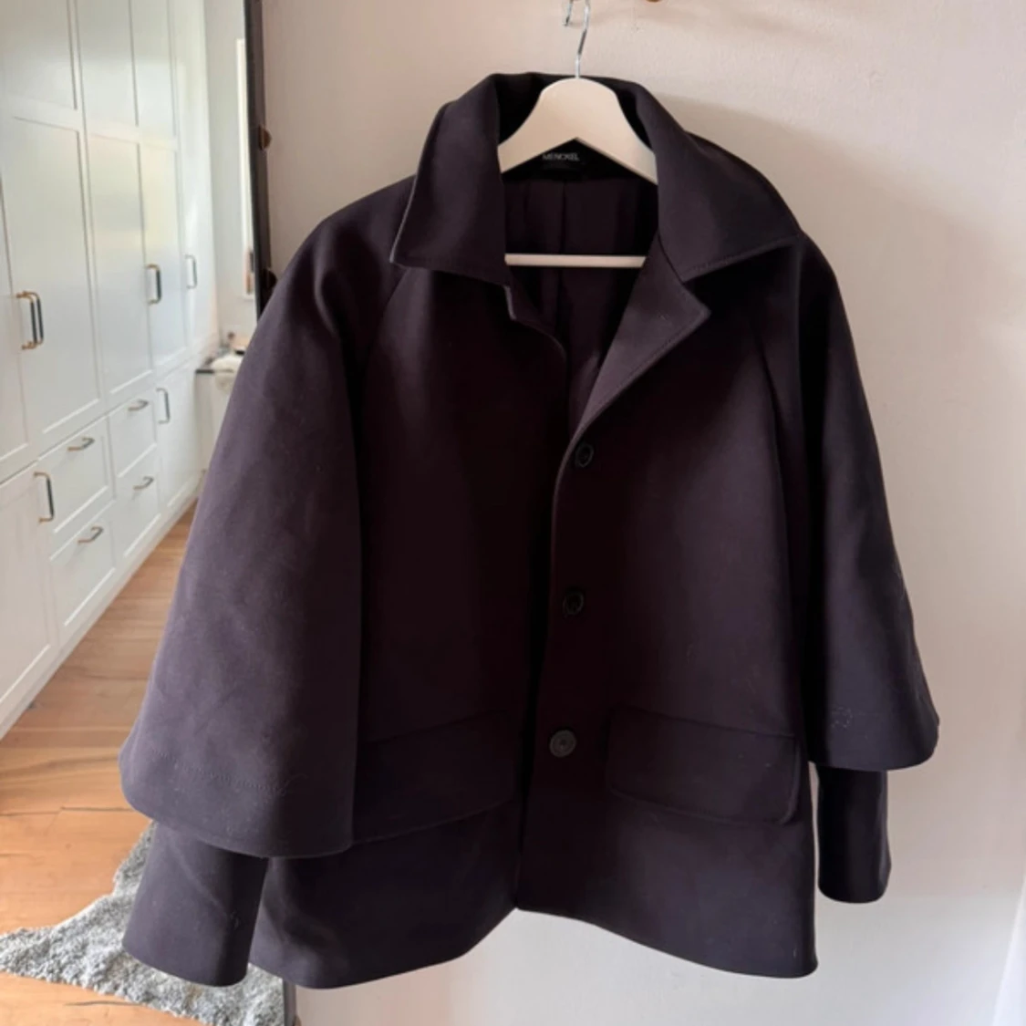 Svart kappa från Menckel