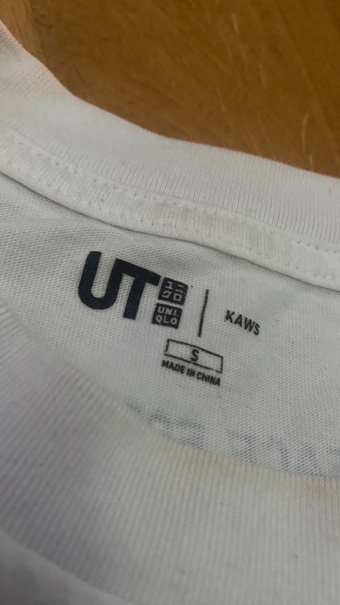 Vit KAWS x Uniqlo t-shirt med tryck - 1